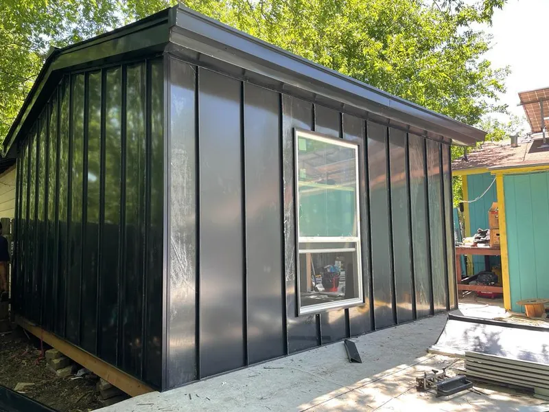 Black standing seam metal wall panels for Metal Roof Installation in Marshfield