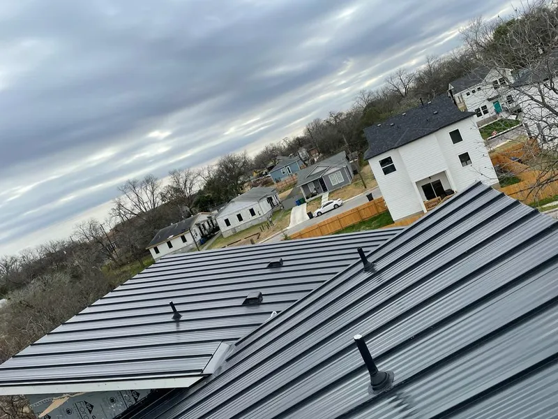 Standing seam metal roof panels with vents for Skylight Repair in Marshfield